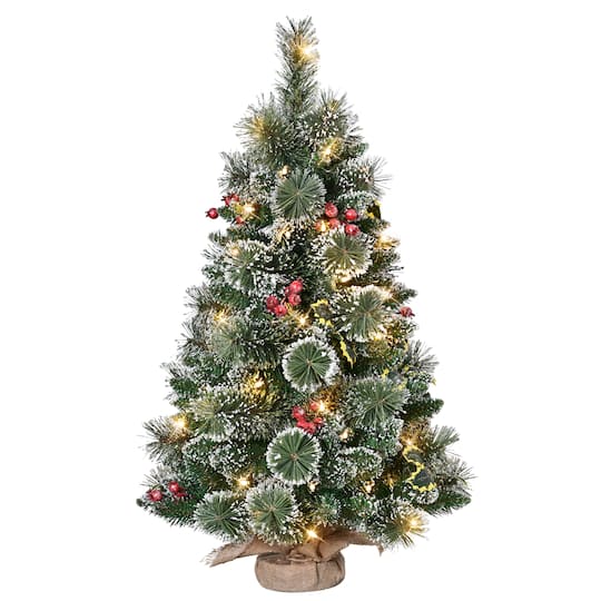 Puleo 3ft. Pre-Lit Snowy Pine with Holly Leaves & Berries Artificial Christmas Tree in Burlap Sack, UL-Listed Incandescent Lights
